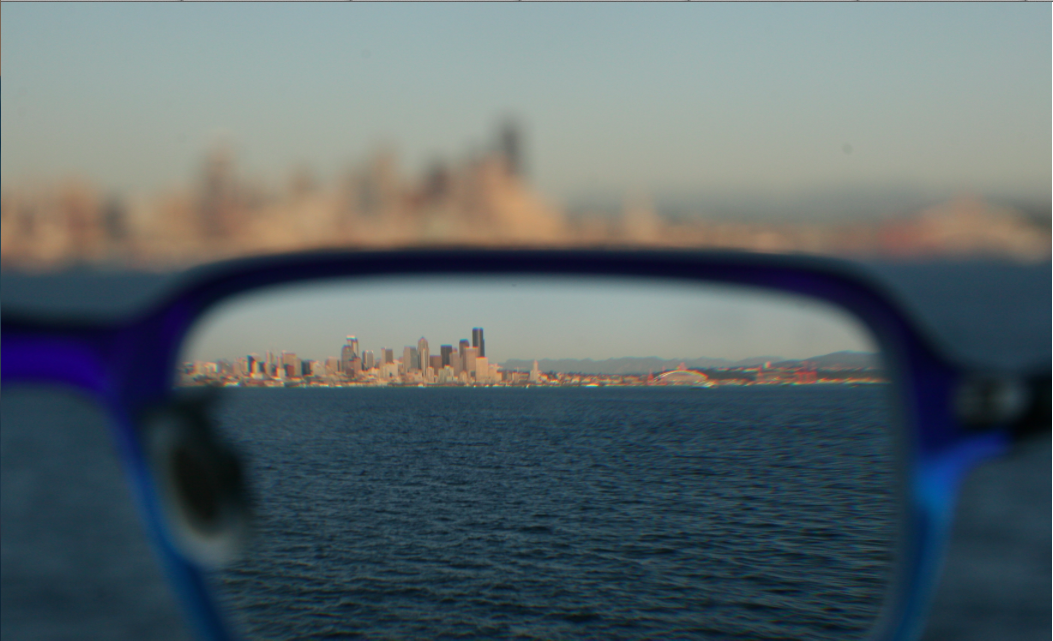 Screen with Vision Correction to Eliminate the Need for Glasses