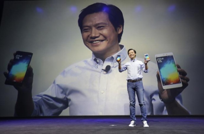 Lei Jun, founder and Chief Executive Officer of China's mobile company Xiaomi, shows Mi Notes at its launch in Beijing January 15, 2015.